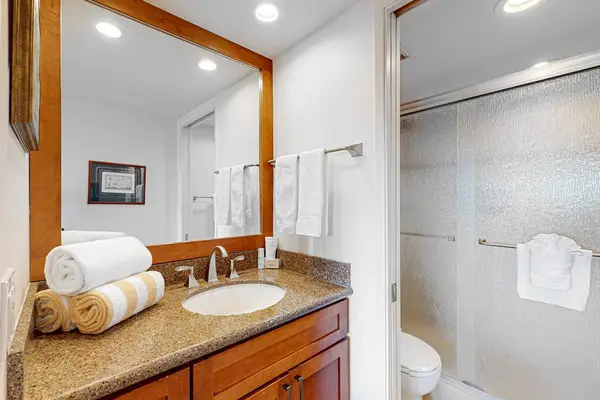 Second bathroom with spacious vanity for daily routines