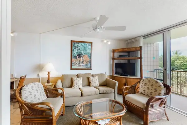 Relax in the bright living room with beautiful ocean views