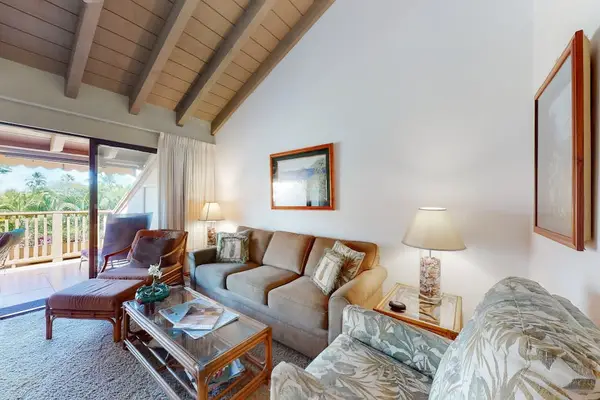 Comfortable Living Space With Vaulted Ceilings