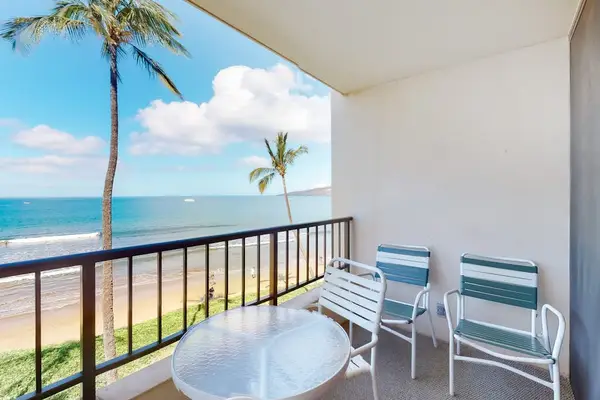 Private lanai steps away from white sandy beaches, so close you can hear the waves crashing.
