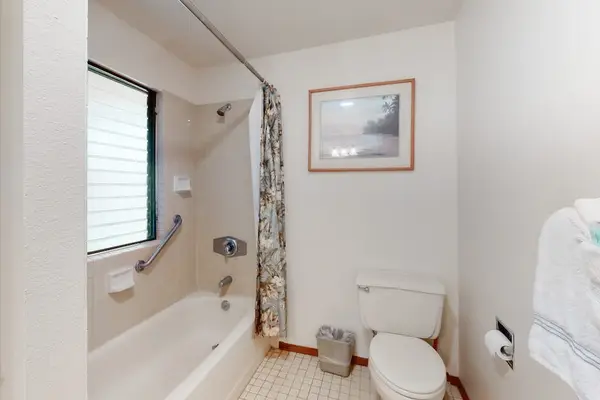 Loft ensuite bath with tub and shower