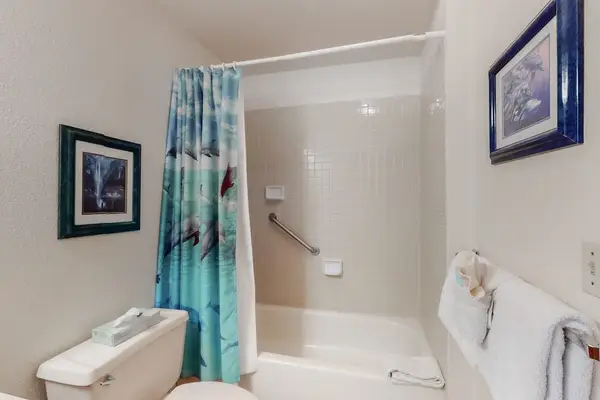 Main level ensuite bath with tub and shower