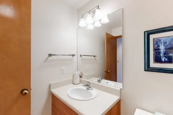 Loft ensuite bath with vanity sink