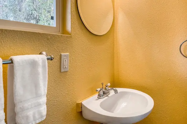 Charming Half Bathroom With Modern Touches