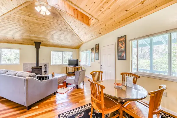 Bright Dining Area With Vaulted Ceiling