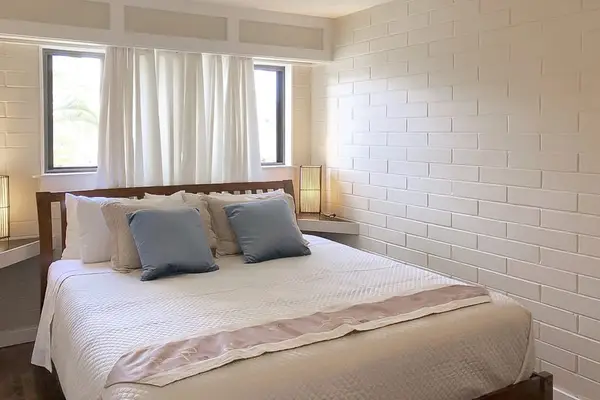 Master bedroom with king bed and lots of natural light.