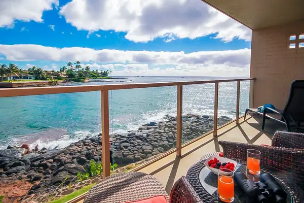 Views of the turquoise waves crashing onto the rocks below from the comfort of your private lanai.