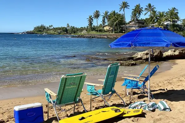 Chairs, umbrellas, cooler and surf boards - ready for a day of fun in the sun.
