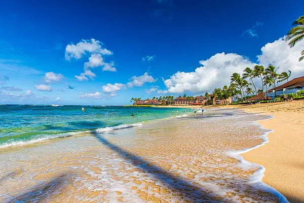 Take a stroll along the white sandy beaches as you listen to the waves crash on the shore.
