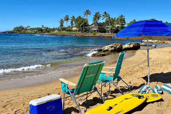 Chairs, umbrella, towels, cooler and boards - ready for our day in the sun.