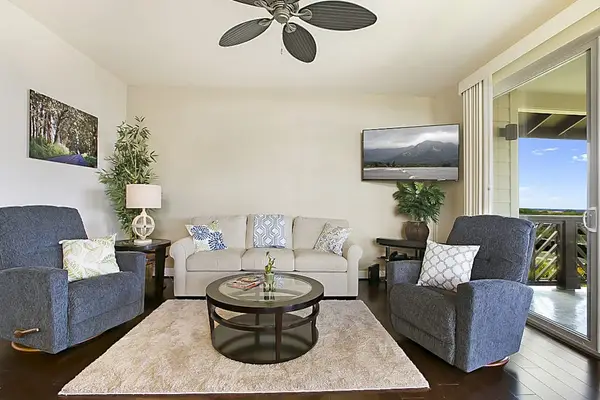 Settle into the bright living room, where you can put your feet up on the couch and two chairs to watch movies on the flatscreen TV. Extra guests? The couch doubles as a queen sleeper sofa. Large picture windows and sliding doors.