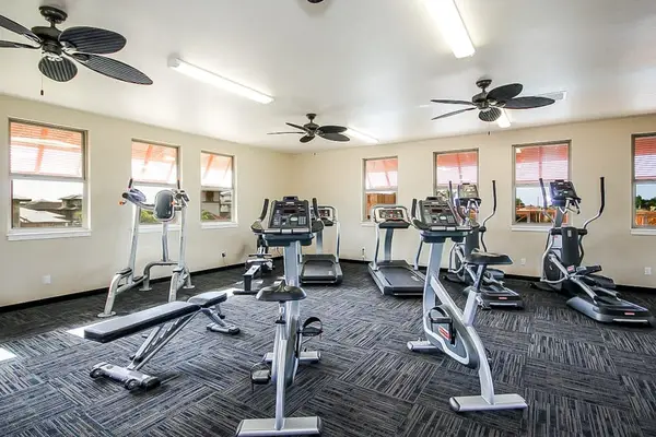 If you’re looking for a resort-style stay, we have you covered. At no additional charge, Pili Mai has a beautiful recreational deck! There’s both an adult and children’s pool, hot tub, outside shower, and an air-conditioned workout area.