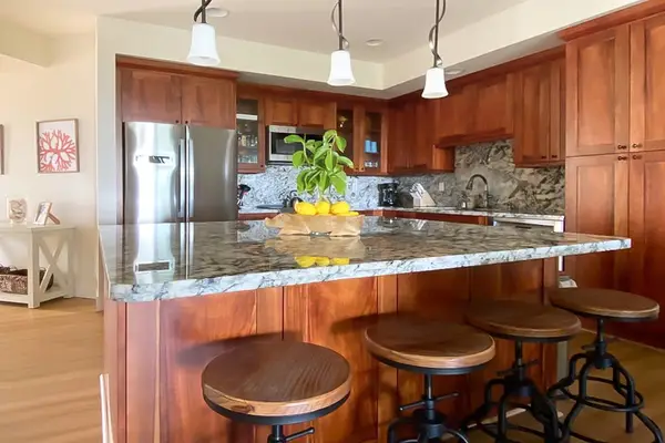 Chef's Kitchen With Granite Island