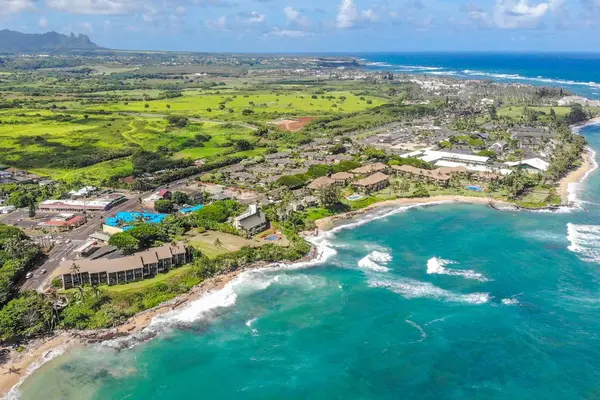 Aerial view showcasing the beautiful coastline and resort
