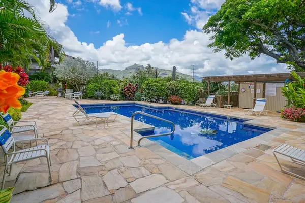 Spacious pool deck with lounge seating