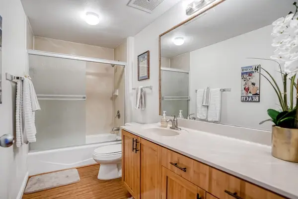 Full bathroom with vanity and walk-in shower