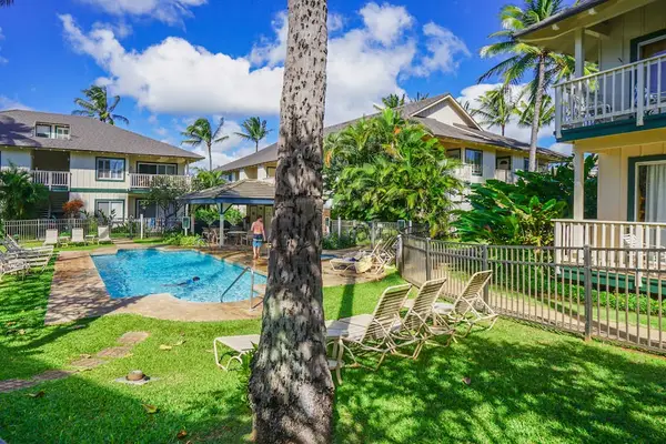 Resort pool with lounge chairs for sunny afternoons
