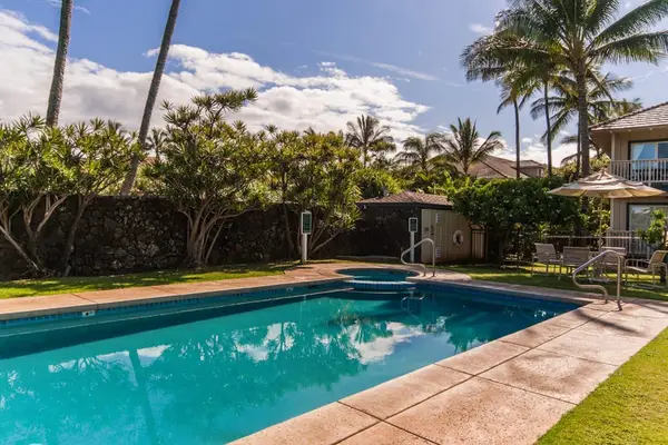 Lounge by the pool with cool island breezes