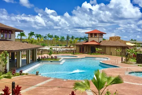 Spend sunny afternoons beside the sparkling pool