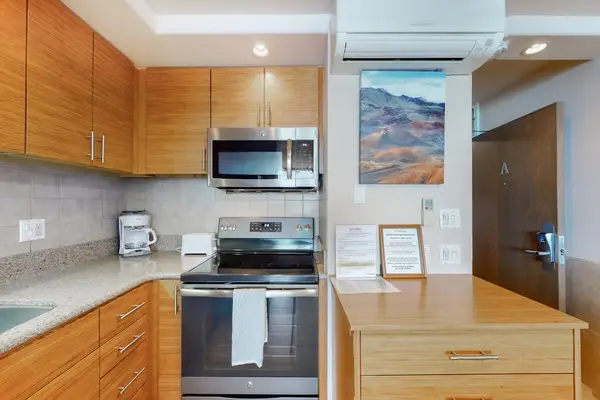 Clean and functional kitchen space right near the entryway
