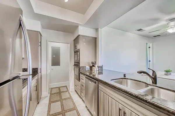 Sleek Galley Kitchen With Premium Appliances