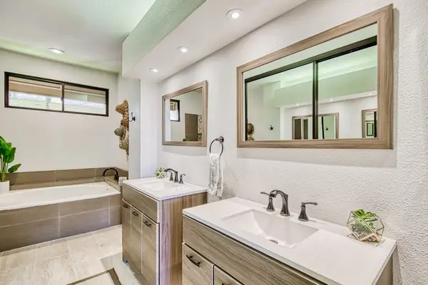 Ensuite bathroom includes double vanity and relaxing soaking tub