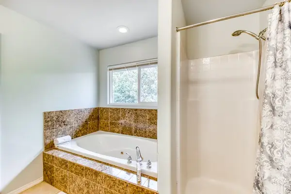 Full Bathroom With Soaking Tub