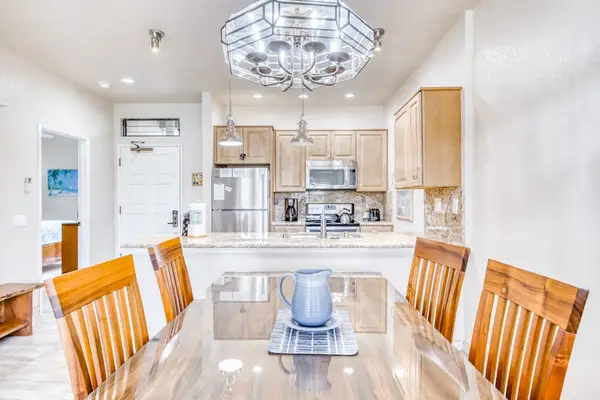 Bright dining space conveniently located beside the kitchen