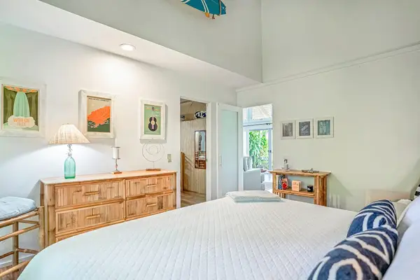 Inviting guest bedroom with plenty of natural light.