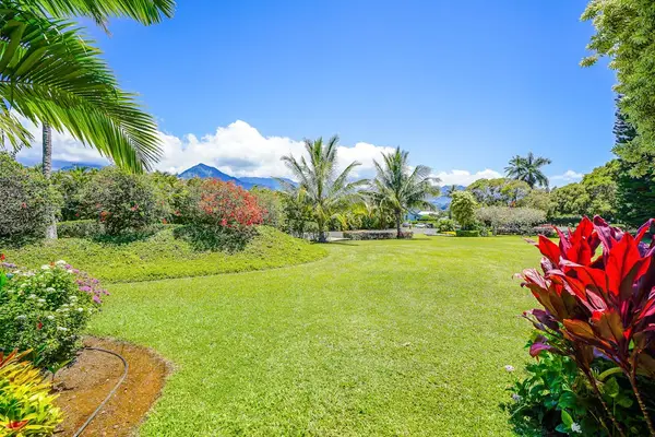 Beautiful exterior surrounded by lush tropical landscaping.