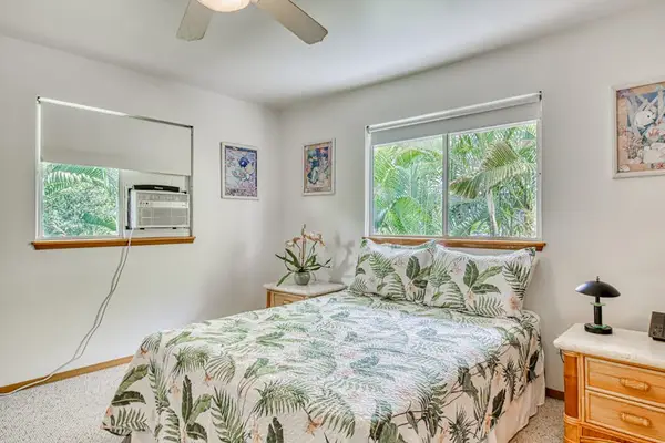 Comfortable Bed, Dual Nightstands, Window A/C Unit, Ceiling Fan & Scenic Windows