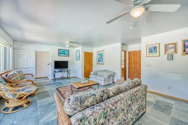 Comfortable Sofa Seating, TV Setup, Vaulted Ceiling Fan Light & Open Layout