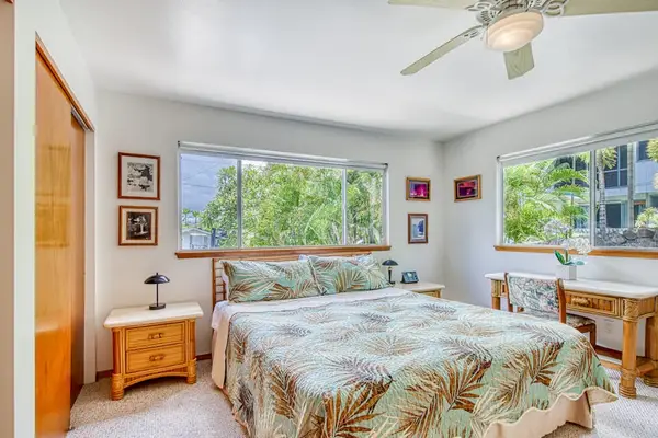 Comfortable Bed, Nightstands, Ceiling Fan, Closet Storage & Large Scenic Windows