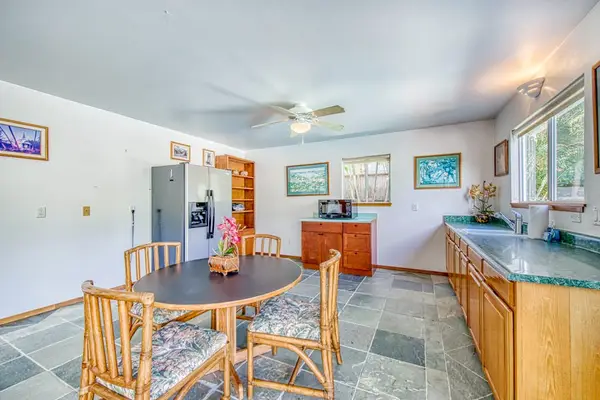 Round Dining Table, Kitchen Prep Counters, Microwave & Tile Flooring