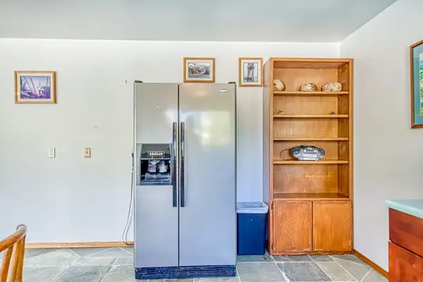 Stainless Steel Refrigerator, Ice/Water Dispenser & Wooden Pantry Shelving