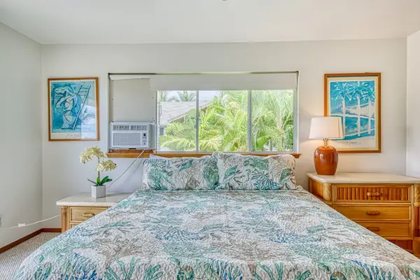 Plush King Bed, Matching Nightstands, Window A/C Unit & Scenic Views