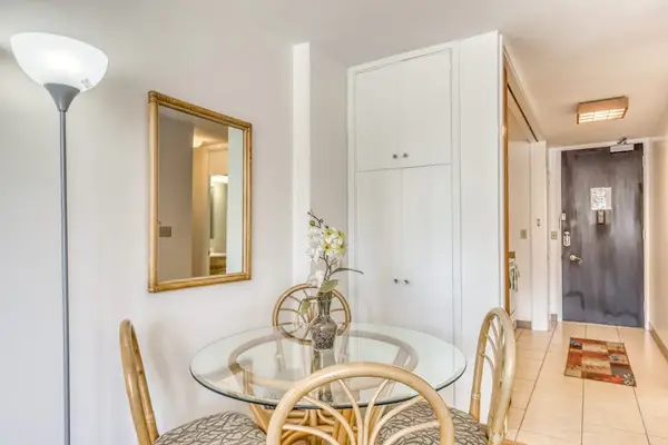 Enjoy cozy breakfasts and relaxed dinners at the inviting round dining table.