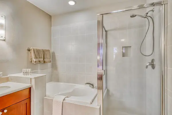 Full bathroom with a walk-in shower