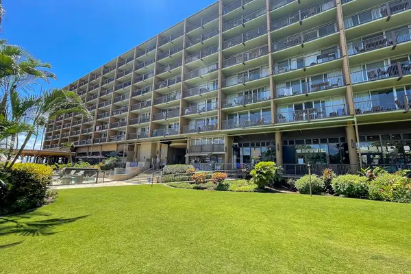 Resort entrance surrounded by lush gardens