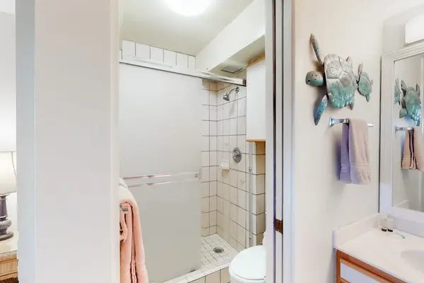 Full bathroom with a shower and fresh towels