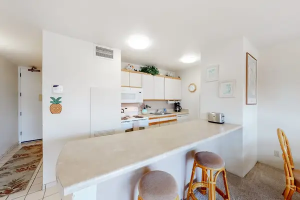 Open kitchen with convenient breakfast bar seating