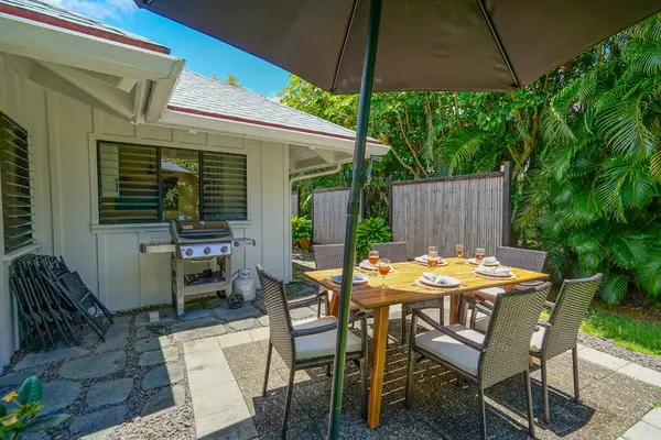 Brand new outdoor dining area waiting to accommodate your entertaining needs or to simply enjoy just preparing a family dinner in the garden.