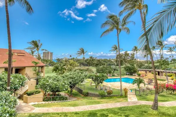 Tropical gardens with resort pool views