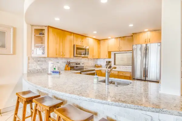 Chef Inspired Kitchen With Island Seating