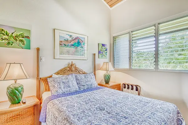 Primary bedroom filled with natural light