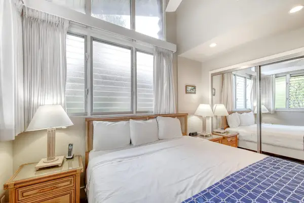 Bright King Bedroom With Lofted Ceilings