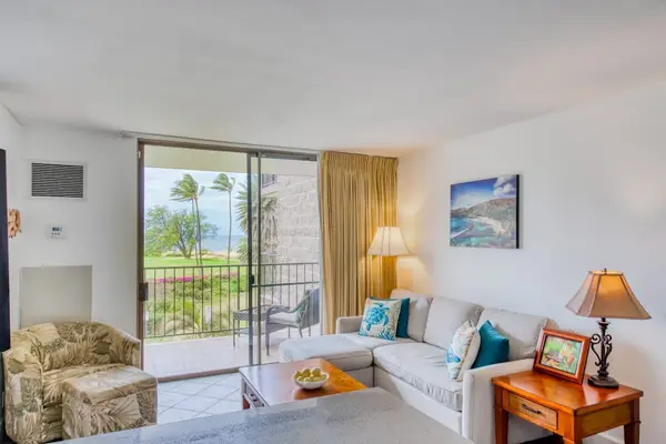 Bright open-concept living room with a private lanai