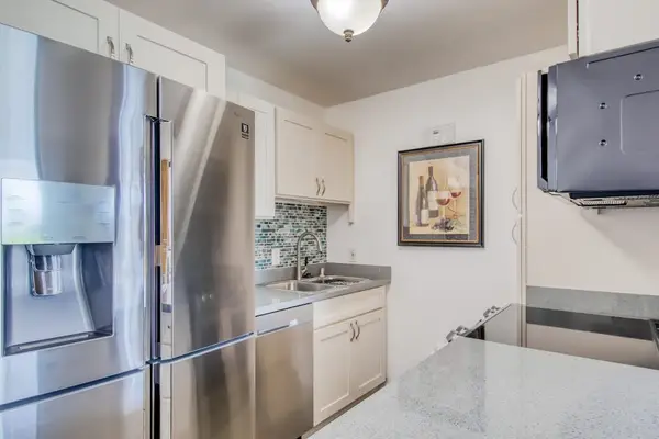 Modern kitchen with stainless steel appliances