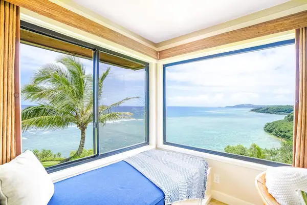 Daybed nook with sweeping ocean and coast views