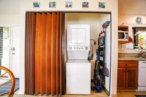 In-unit washer and dryer located conveniently off the kitchen area